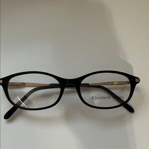 Elizabeth Arden Elegant Black and Gold Frames